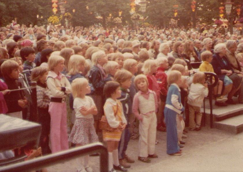 Amir talking at a party in the U.S.